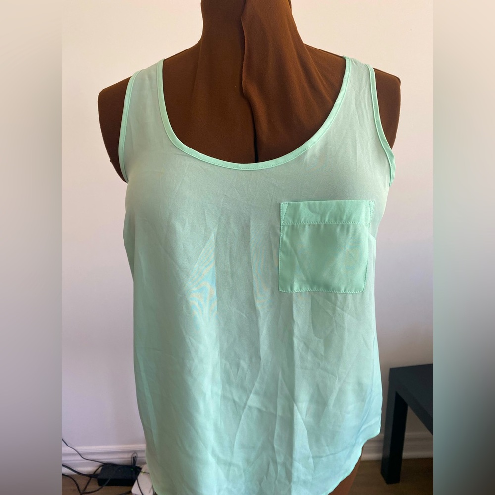 💙FADED GLORY 💙sleeveless top in Aqua. Size 7/8(medium).